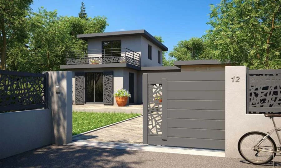 Façade en pierre de taille naturelle avec une fenêtre équipée d'un volet roulant gris anthracite partiellement abaissé